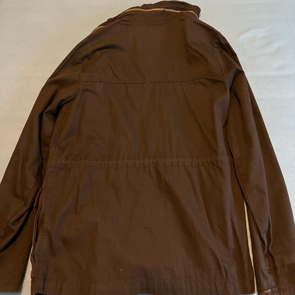 Military Jacket with hood in collar pocket with zipper. Size: S. Color: Blue.